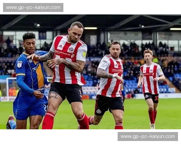 蓝鸟逐梦，潜水艇争雄：加的夫城与维冈竞技的史诗对决，足球的魅力在此燃烧！